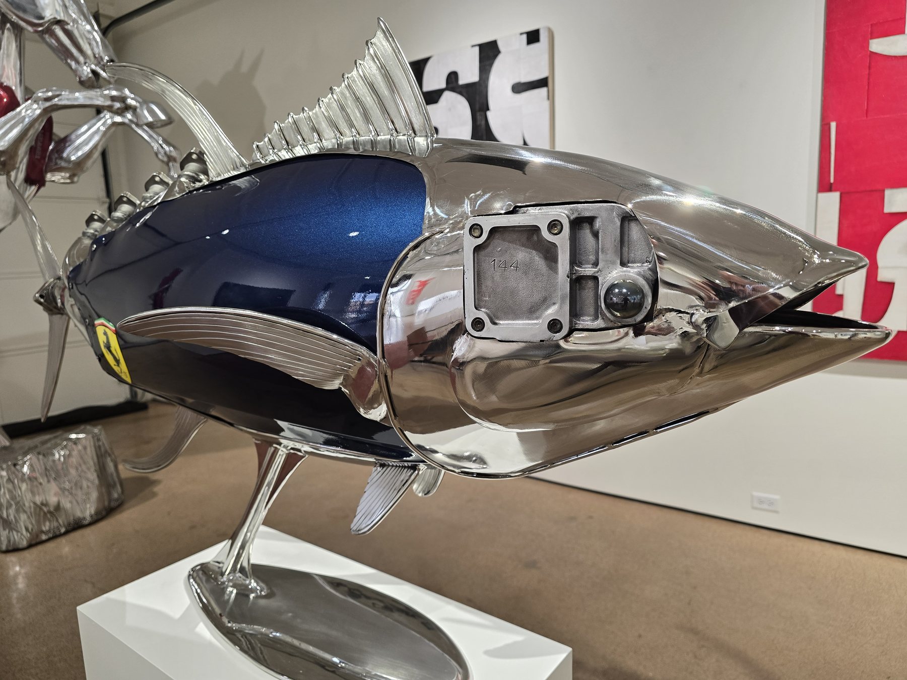Casa Ferrari Arte sculpture on display within an exhibition setting